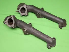 555696 General Motors 555697 Oem 1949-52 Oldsmobile Olds Passenger And Driver Exhaust Manifolds