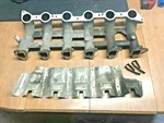 87-96 Ford F150 4.9L 300 Lower Intake Manifold RF-E7TE-9K461-A5E + Heat Shield. Fixed Price $335.00.