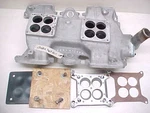 '56 - '60 Pontiac Offenhauser 2X4 Aluminum Intake Manifold 5029 W/5028A Housing. Fixed Price $250.00.