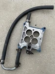 Ford Carb Spacer C5SE-9A589. Fixed Price $39.00.