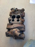 1969 Chevy 4 Barrel Intact Manifold 3965577. Fixed Price $200.00.