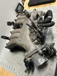 2000-04 Nissan Xterra Upper Intake Manifold 3.3L With Pipes Throttle Body( 320). Fixed Price $110.00.