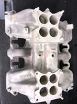 1956 Cadillac 2X4. Intake Manifold 1464580. Fixed Price $500.00.