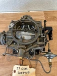 57' Olds Rochester Carburetor 7009470. Fixed Price $300.00.
